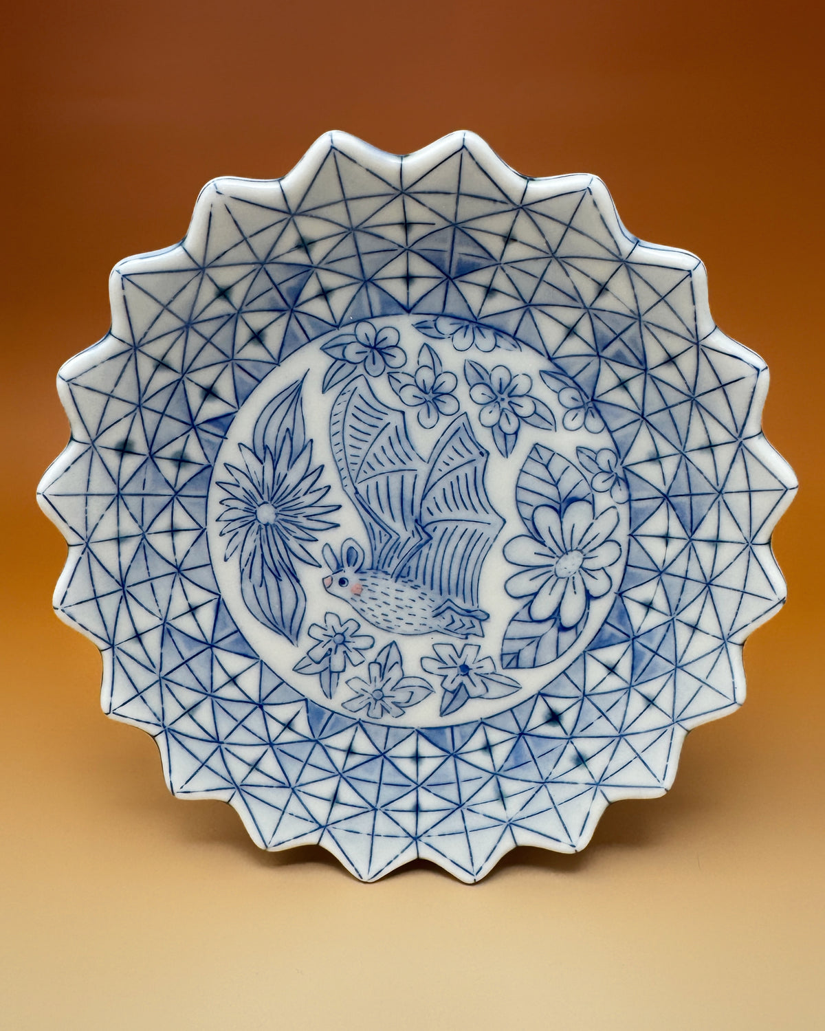 31_Blue & White Bat Plate 6.8" diameter