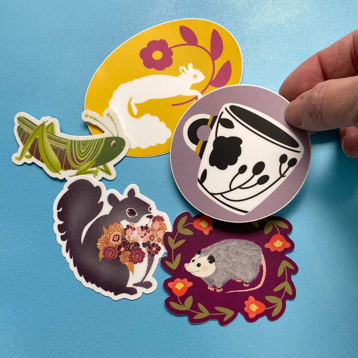 Vinyl Sticker: Smiling Opossum with Flowers