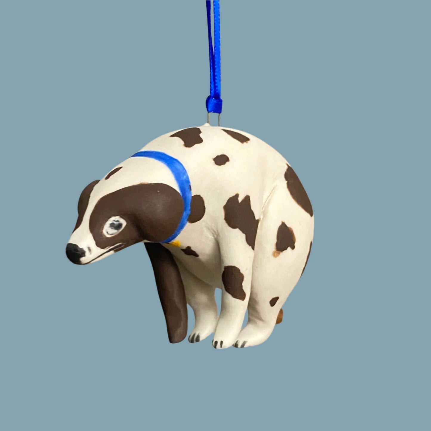 55 Pooping Dog Ornament