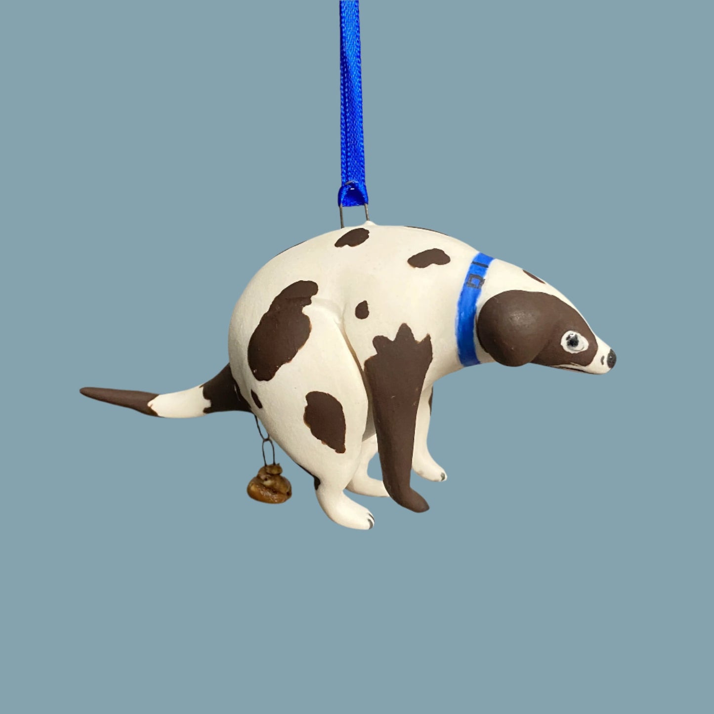 55 Pooping Dog Ornament