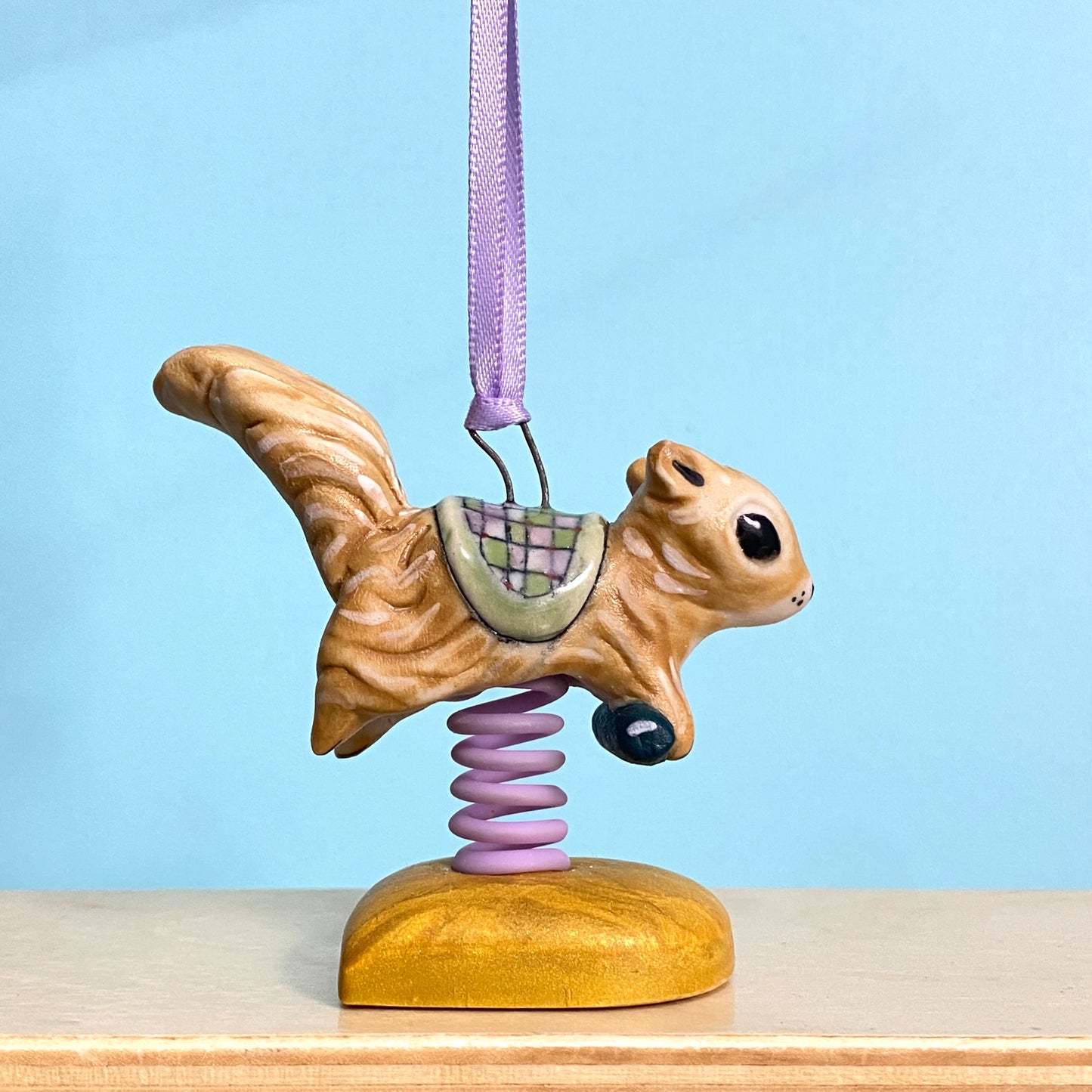 58B Squirrel Spring Rider Ornament