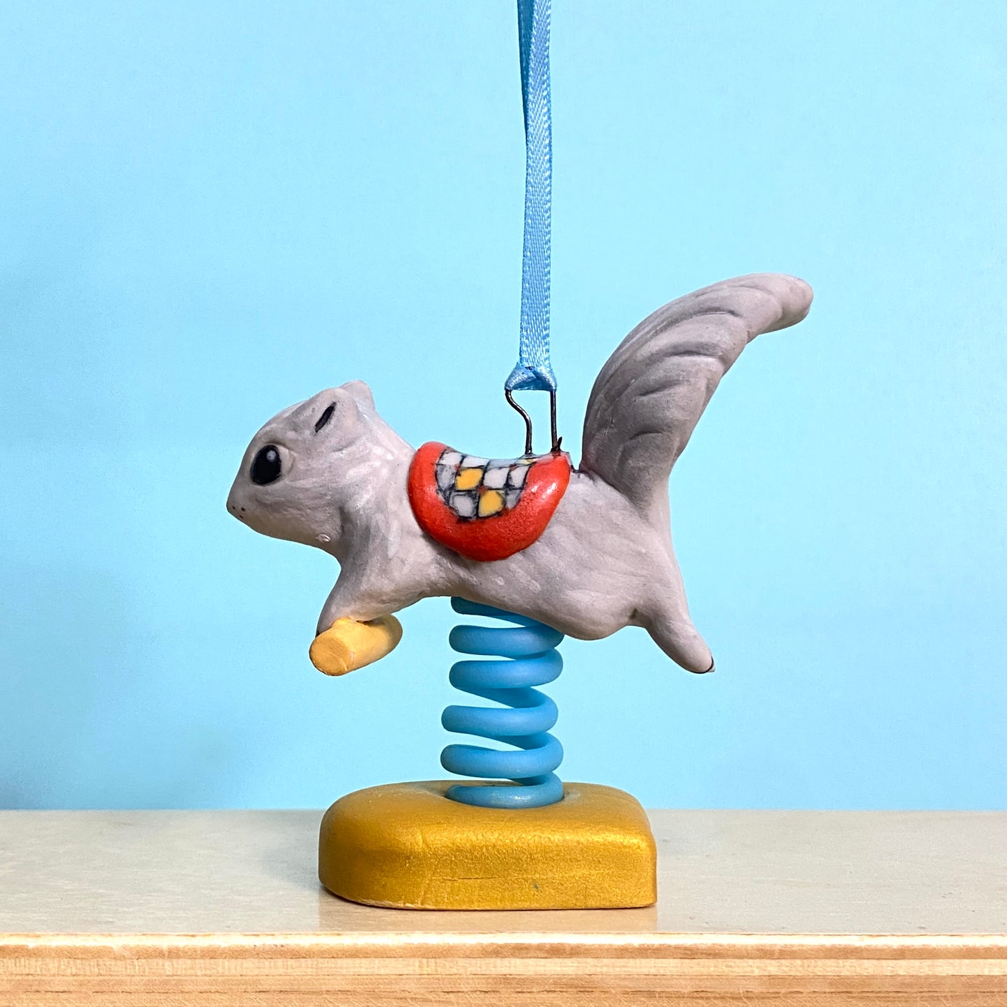 58C Squirrel Spring Rider Ornament