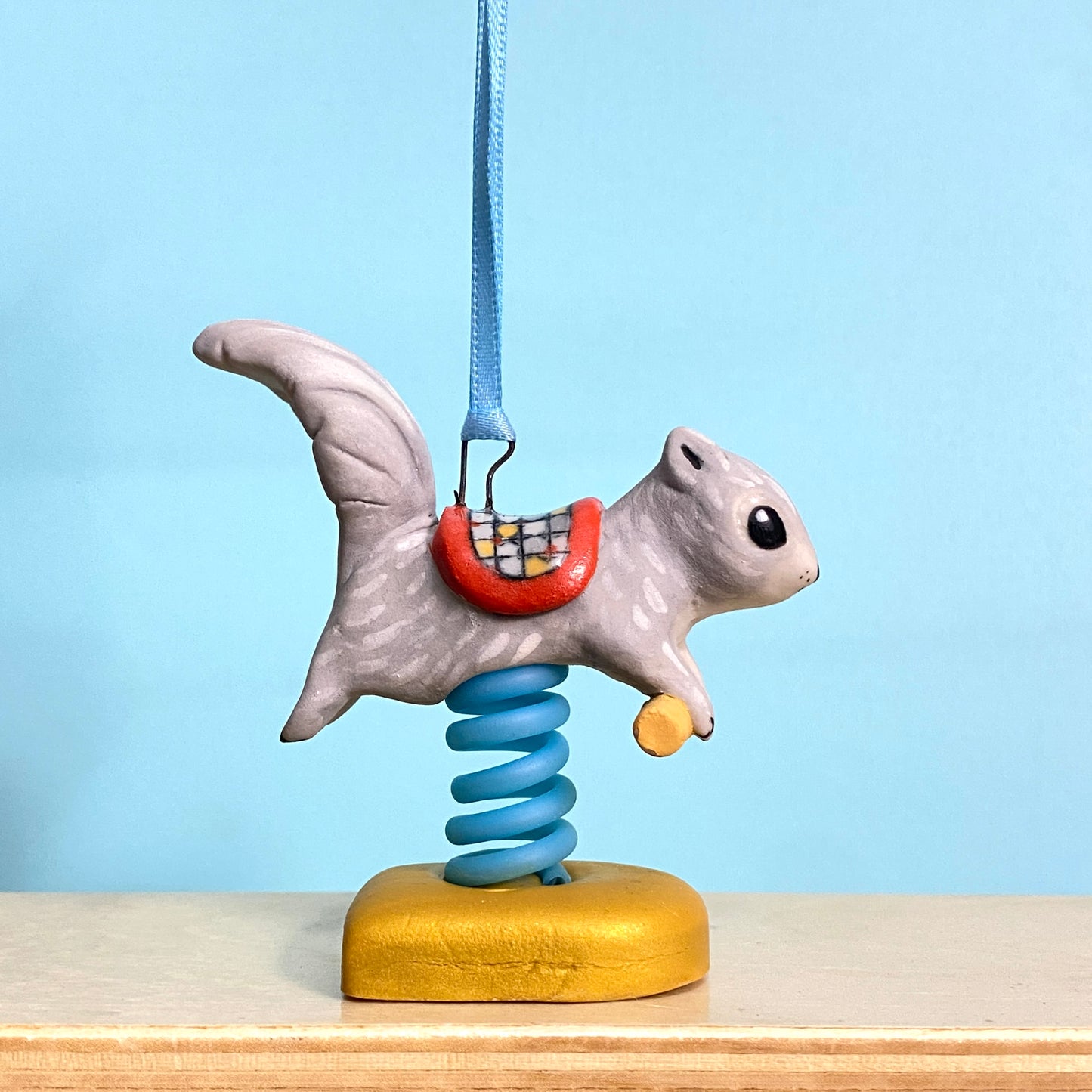 58C Squirrel Spring Rider Ornament